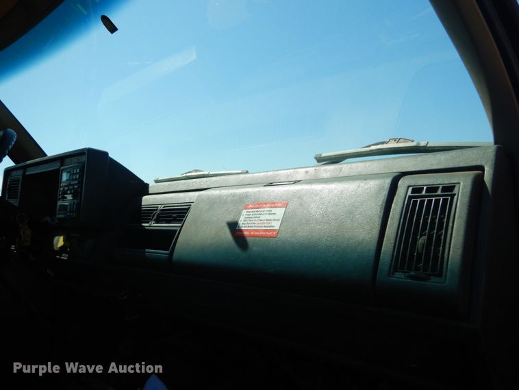 image for item JG9129 2002 GMC 7500  rollback truck