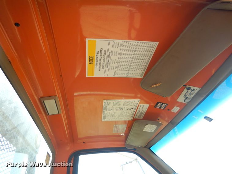 image for item JG9129 2002 GMC 7500  rollback truck