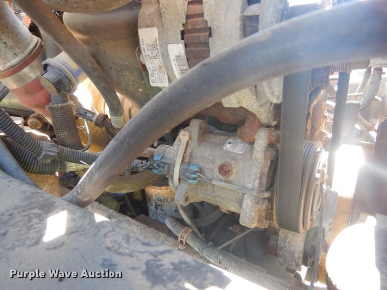 image for item JG9129 2002 GMC 7500  rollback truck