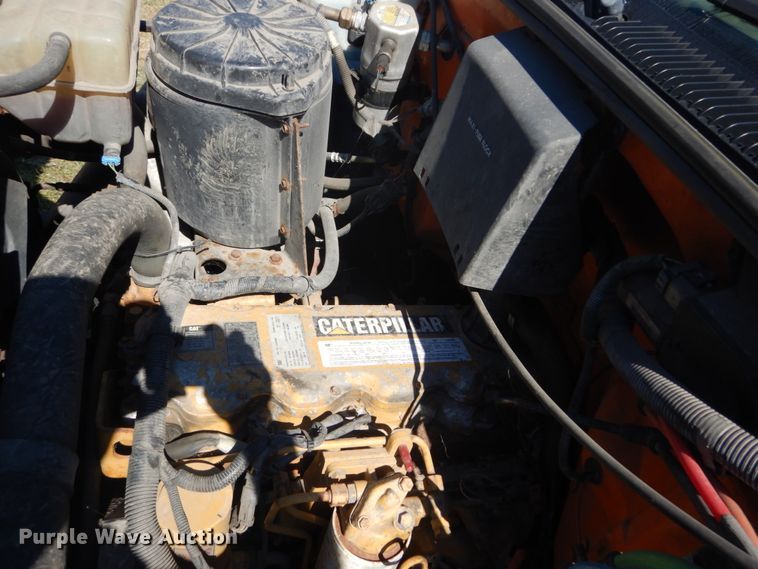 image for item JG9129 2002 GMC 7500  rollback truck