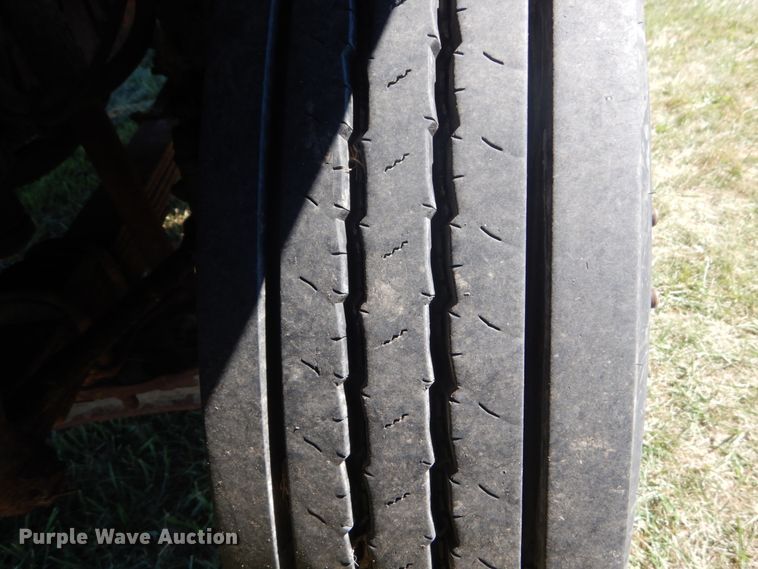 image for item JG9129 2002 GMC 7500  rollback truck