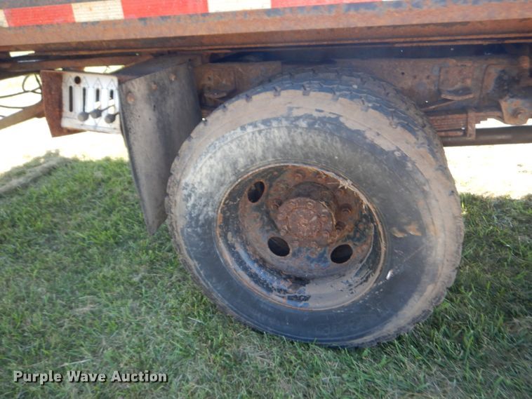 image for item JG9129 2002 GMC 7500  rollback truck