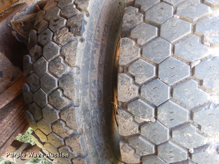 image for item JG9129 2002 GMC 7500  rollback truck