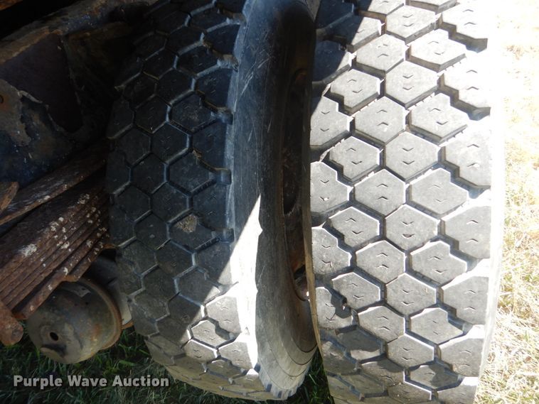 image for item JG9129 2002 GMC 7500  rollback truck