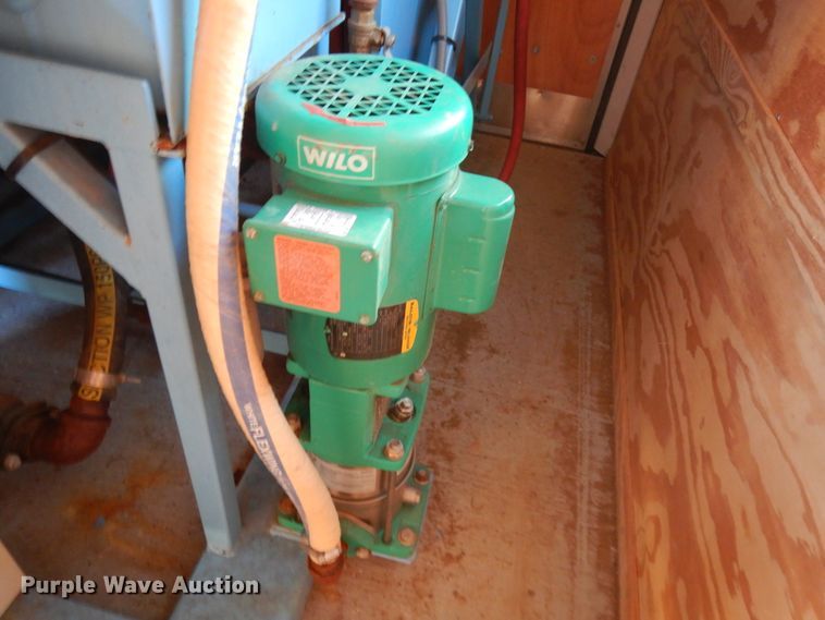 image for item JQ9148 2014 Lark United  enclosed cargo trailer with ground thaw machine