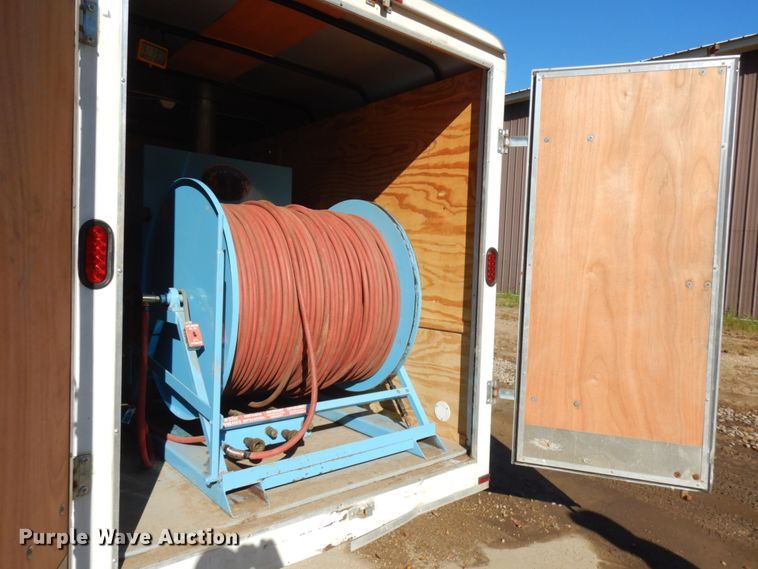 image for item JQ9148 2014 Lark United  enclosed cargo trailer with ground thaw machine