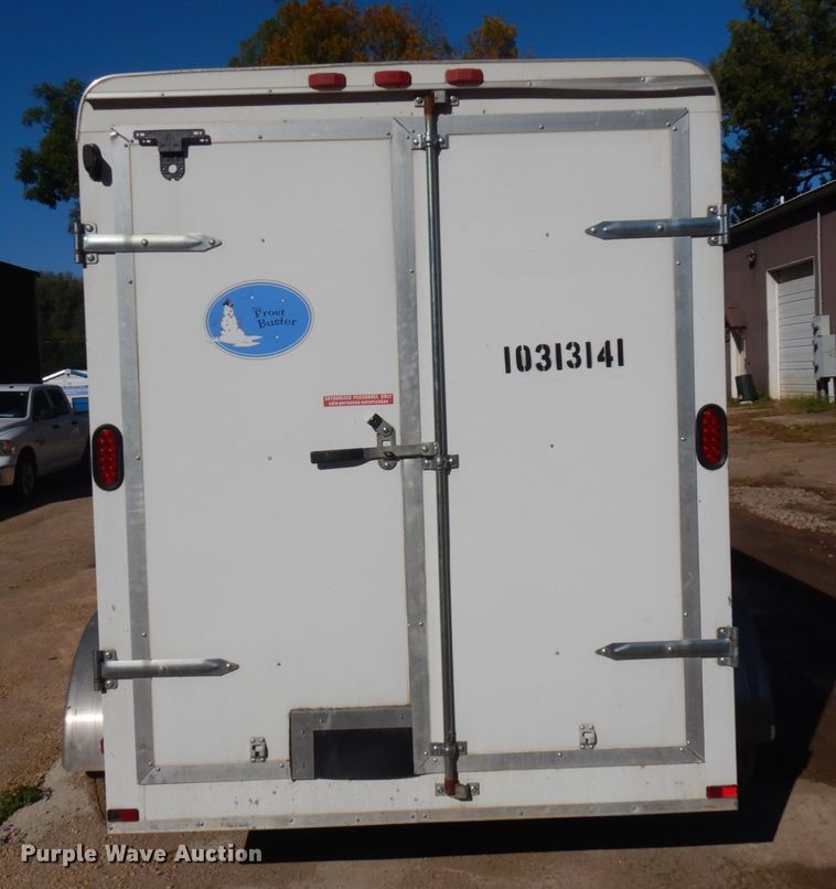 image for item JQ9150 2014 Lark United  enclosed cargo trailer with ground thaw machine