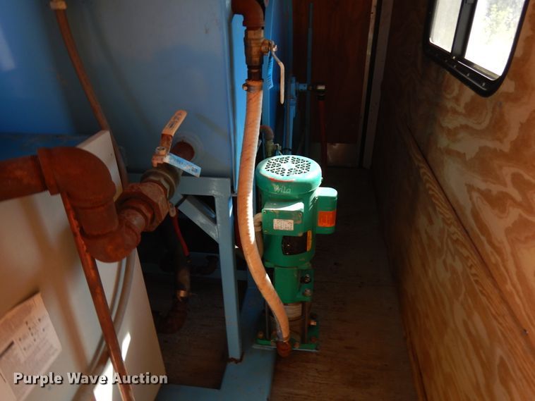 image for item JQ9151 2014 Lark United  enclosed cargo trailer with ground thaw machine