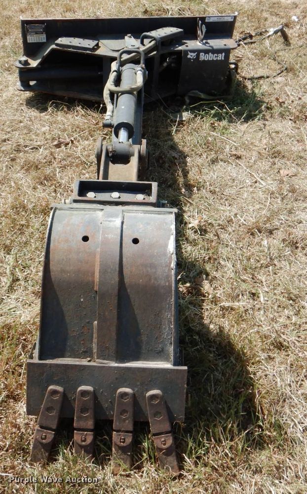 image for item KQ9718 Bobcat Bobtach skid steer backhoe
