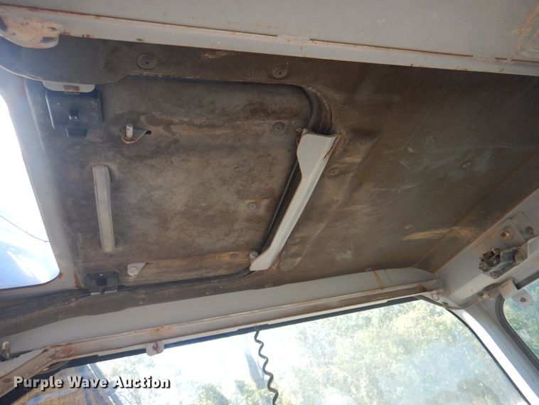 image for item KX9337 2000 Komatsu PC128US-2  excavator