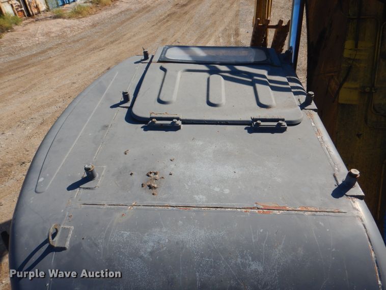 image for item KX9337 2000 Komatsu PC128US-2  excavator