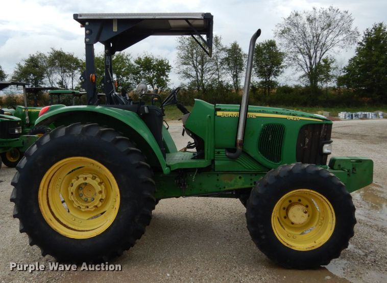 image for item KI9545 2002 John Deere 6420  MFWD tractor