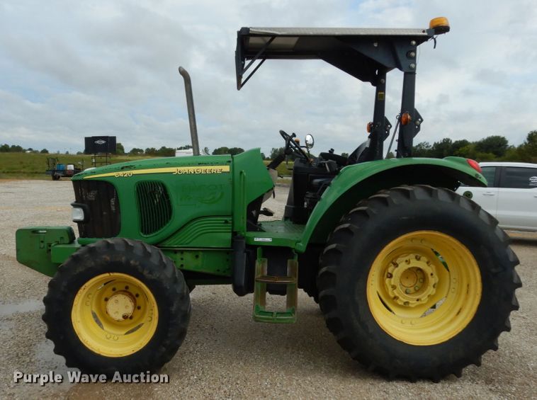image for item KI9545 2002 John Deere 6420  MFWD tractor