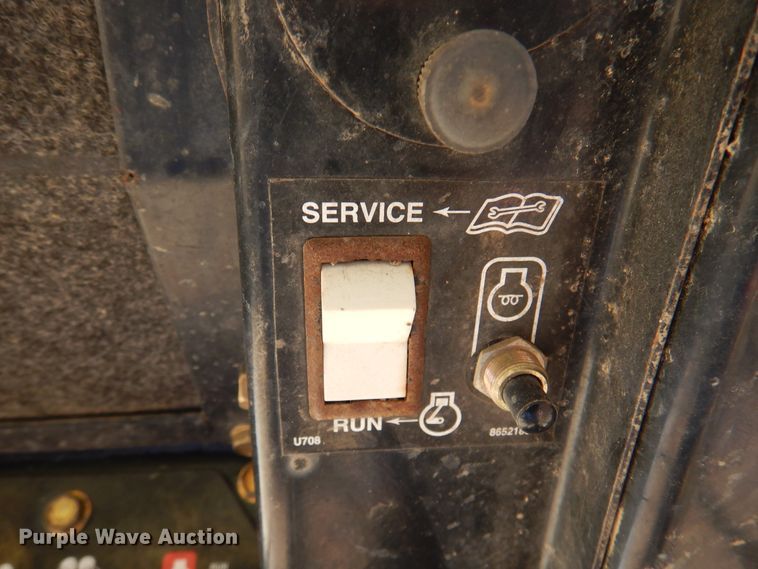 image for item DI5291 1998 John Deere 5575  skid steer loader