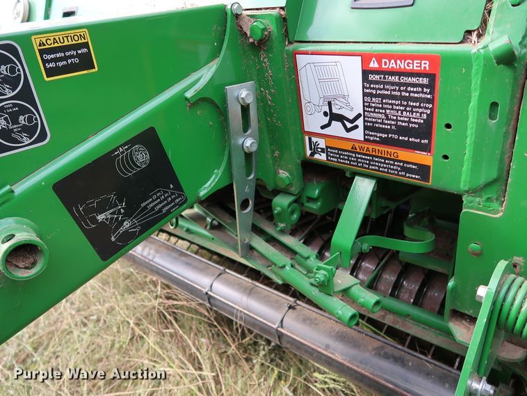 image for item KQ9712 2016 John Deere 469  round baler