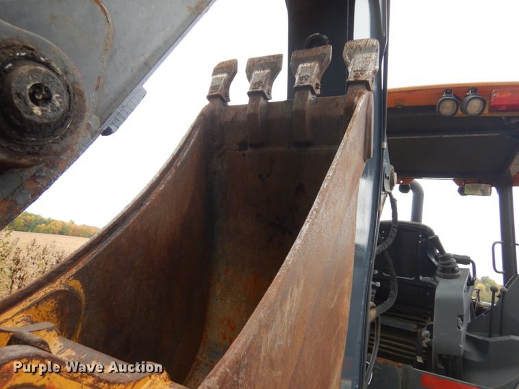 image for item JQ9329 2013 John Deere 310SK  backhoe