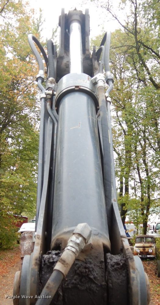 image for item JQ9329 2013 John Deere 310SK  backhoe