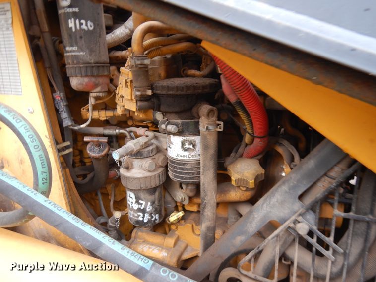 image for item JQ9329 2013 John Deere 310SK  backhoe