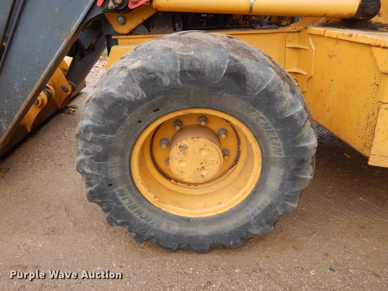 image for item JQ9329 2013 John Deere 310SK  backhoe