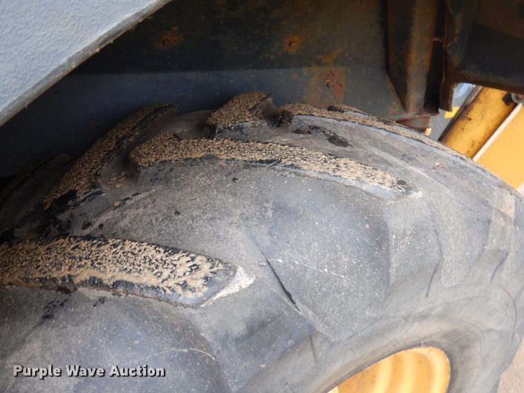 image for item JQ9329 2013 John Deere 310SK  backhoe