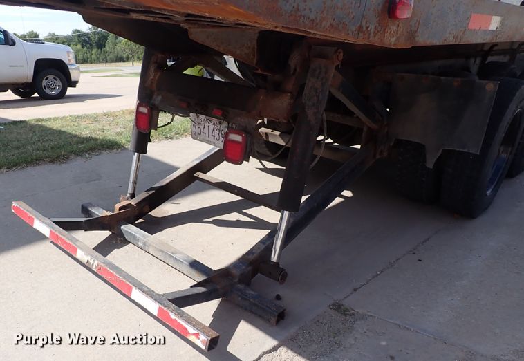 image for item DN2131 1990 Ford LN9000  rollback truck