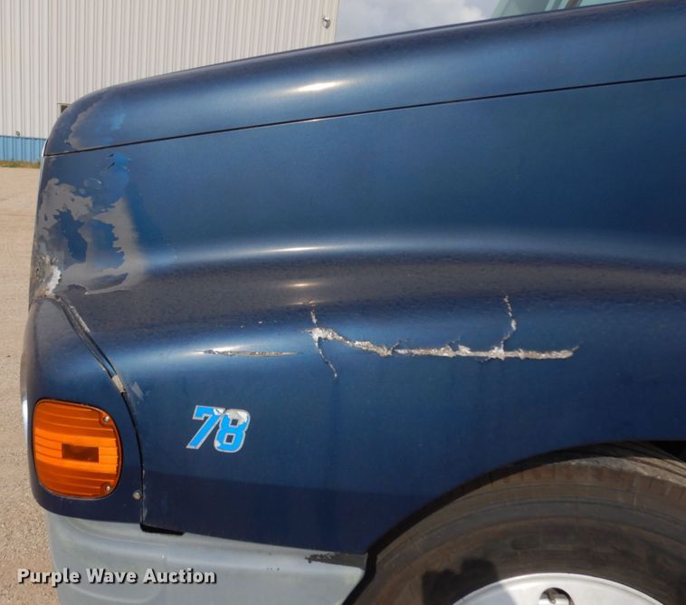 image for item JQ9318 1998 Freightliner FLC120  semi truck