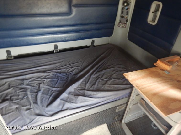 image for item JQ9318 1998 Freightliner FLC120  semi truck