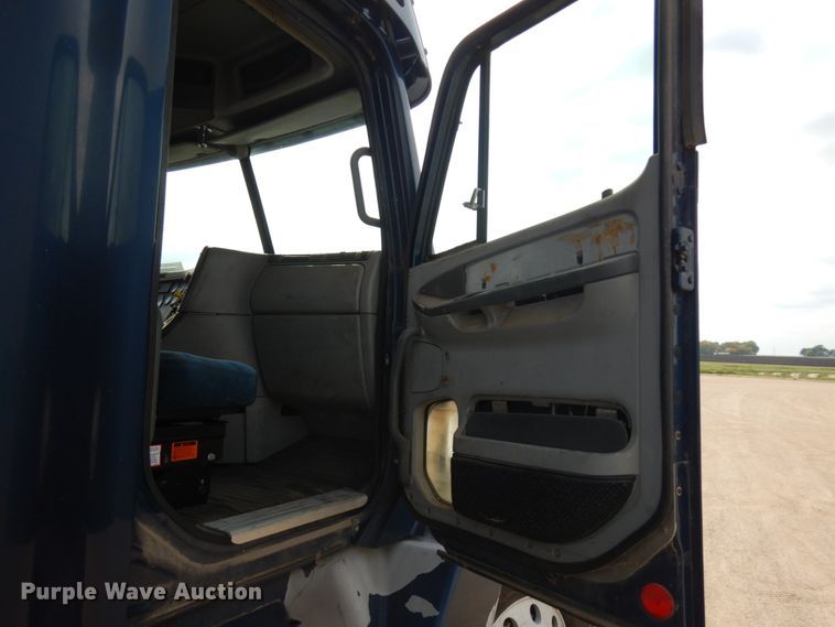 image for item JQ9318 1998 Freightliner FLC120  semi truck