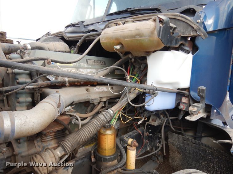 image for item JQ9318 1998 Freightliner FLC120  semi truck