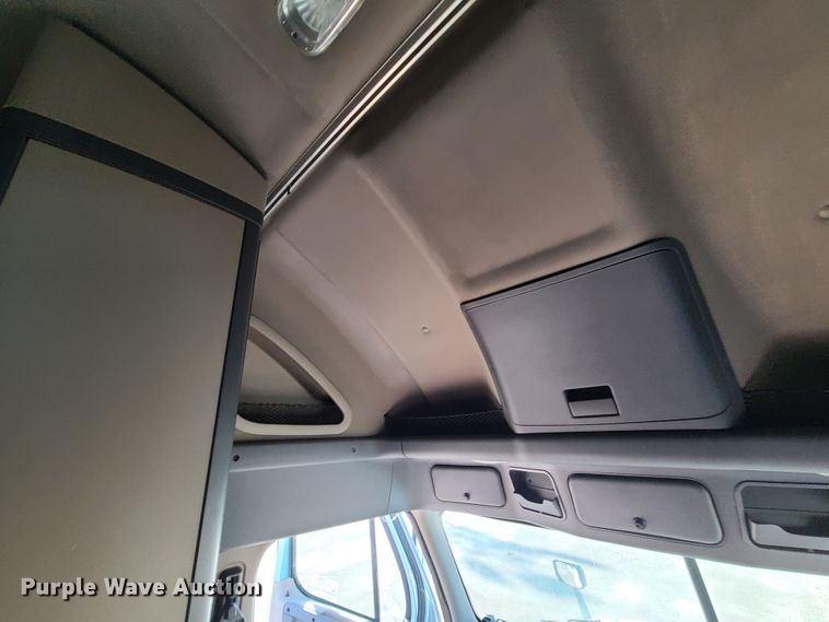 image for item L1253 2011 Freightliner Cascadia 125  semi truck