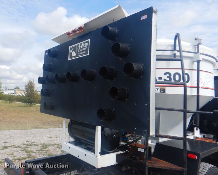 image for item HT9457 2004 Peterbilt 320  pot hole patcher truck