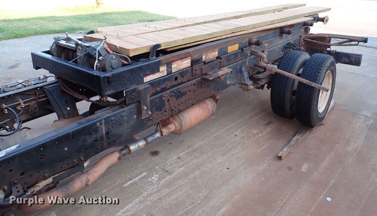 image for item IN9577 2007 GMC W3500  roll-off container truck