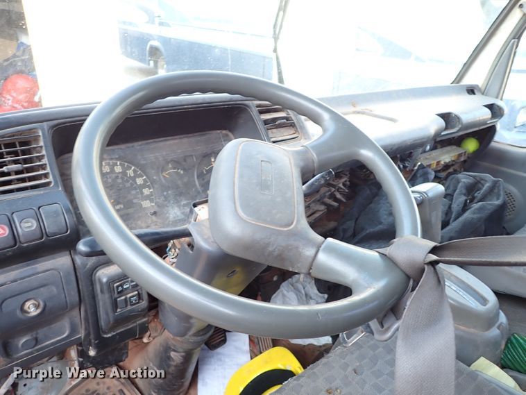 image for item IN9577 2007 GMC W3500  roll-off container truck