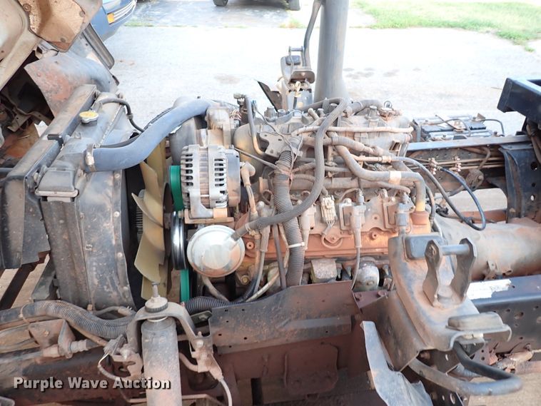 image for item IN9577 2007 GMC W3500  roll-off container truck