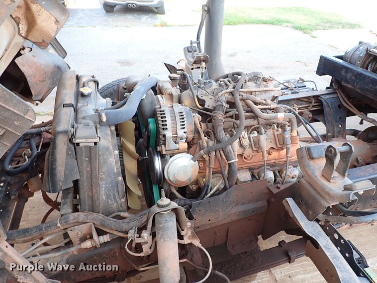 image for item IN9577 2007 GMC W3500  roll-off container truck