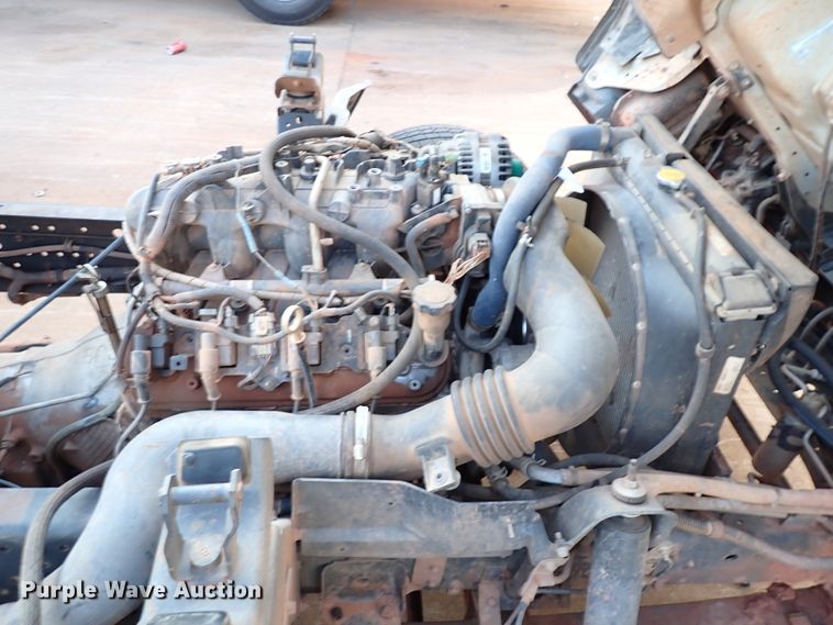 image for item IN9577 2007 GMC W3500  roll-off container truck