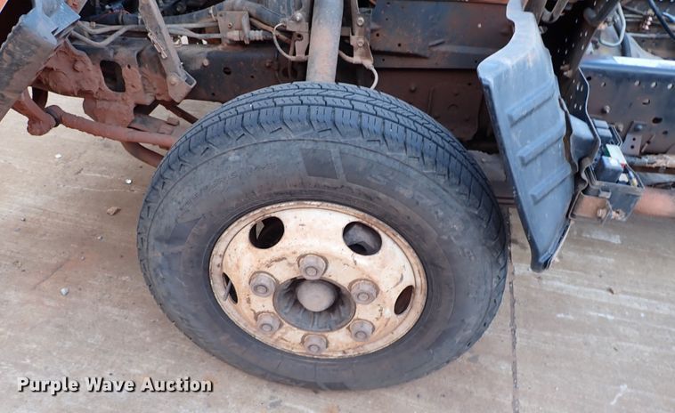 image for item IN9577 2007 GMC W3500  roll-off container truck