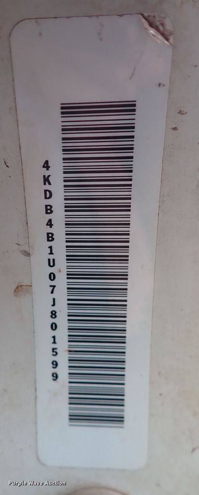 image for item IN9577 2007 GMC W3500  roll-off container truck