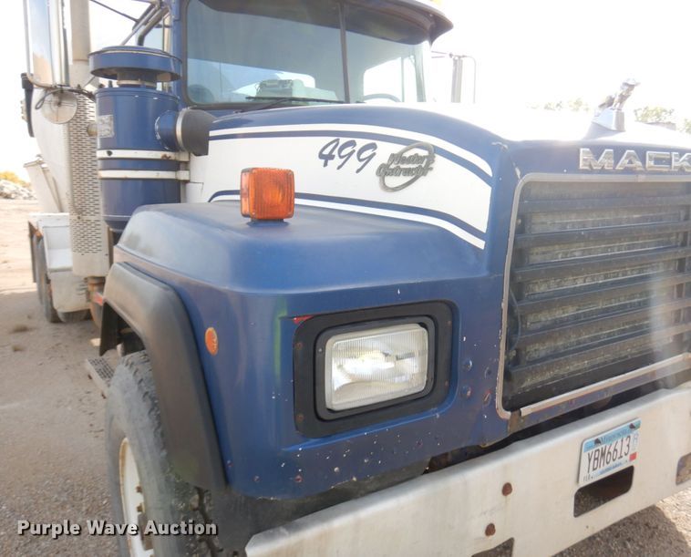 image for item JQ9292 1999 Mack RD690S  ready mix truck