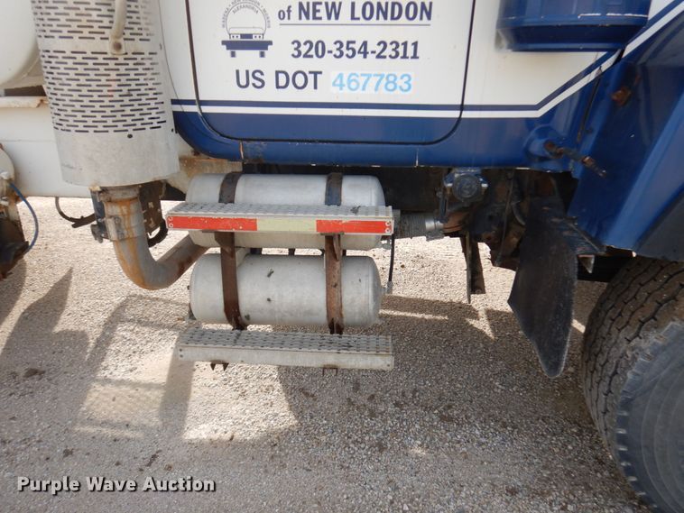 image for item JQ9292 1999 Mack RD690S  ready mix truck