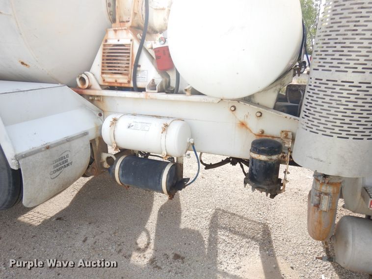 image for item JQ9292 1999 Mack RD690S  ready mix truck