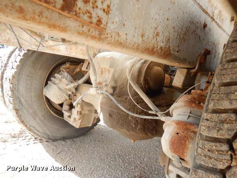 image for item JQ9292 1999 Mack RD690S  ready mix truck