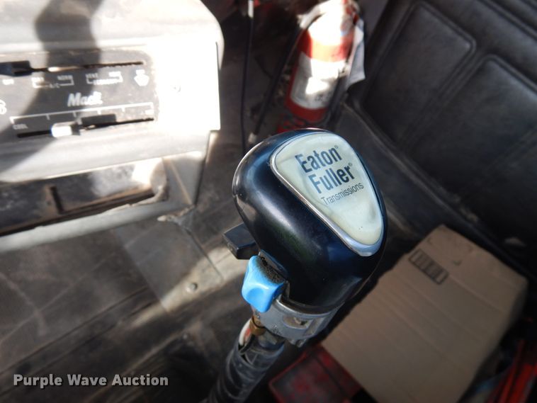 image for item JQ9292 1999 Mack RD690S  ready mix truck