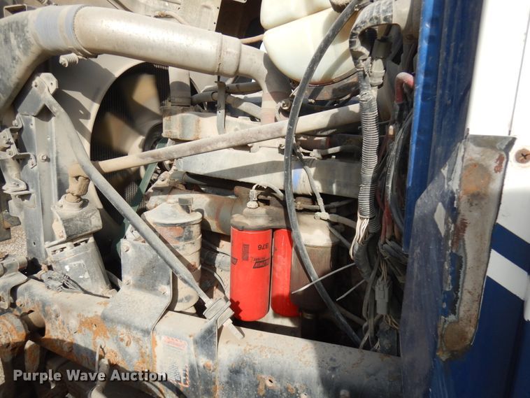 image for item JQ9292 1999 Mack RD690S  ready mix truck