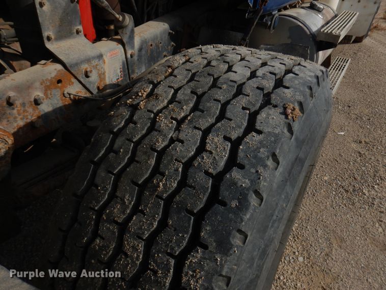 image for item JQ9292 1999 Mack RD690S  ready mix truck