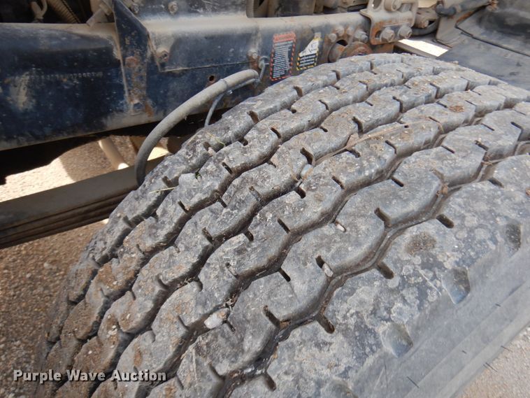 image for item JQ9292 1999 Mack RD690S  ready mix truck