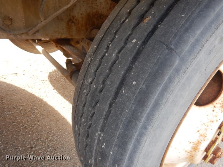 image for item JQ9292 1999 Mack RD690S  ready mix truck