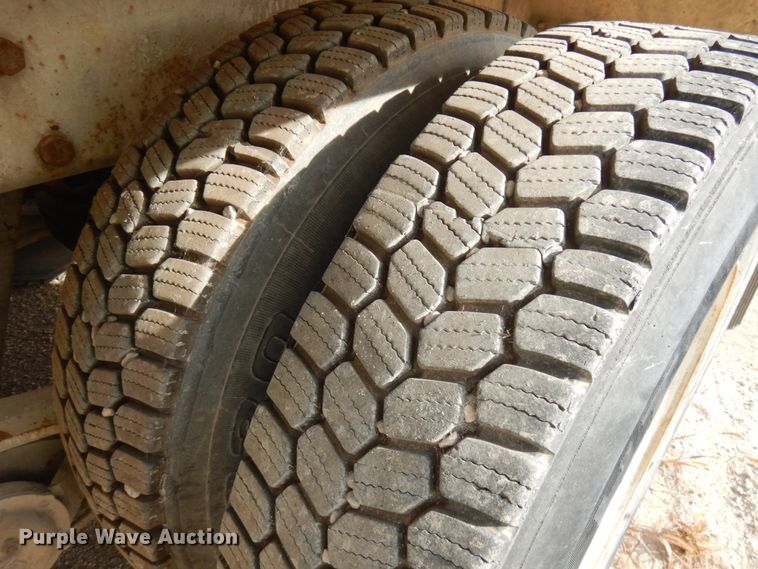 image for item JQ9292 1999 Mack RD690S  ready mix truck