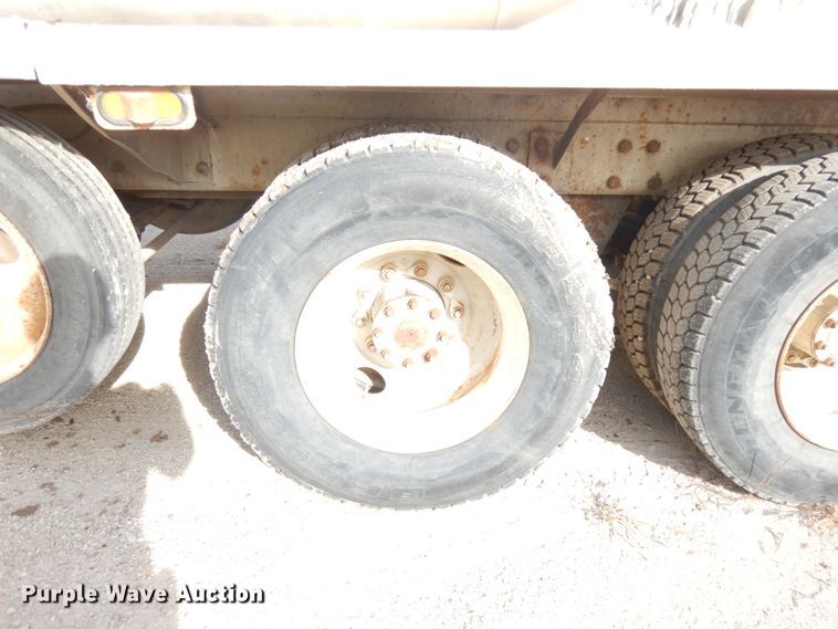 image for item JQ9292 1999 Mack RD690S  ready mix truck