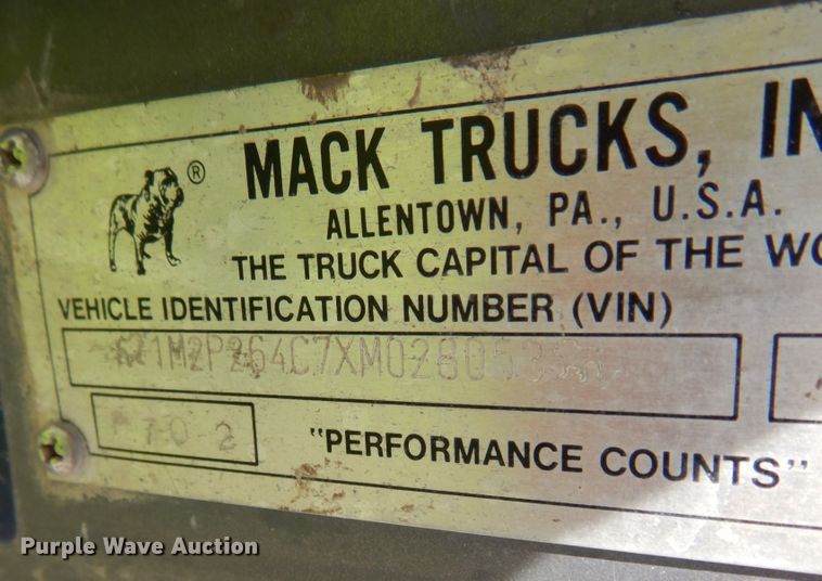 image for item JQ9292 1999 Mack RD690S  ready mix truck